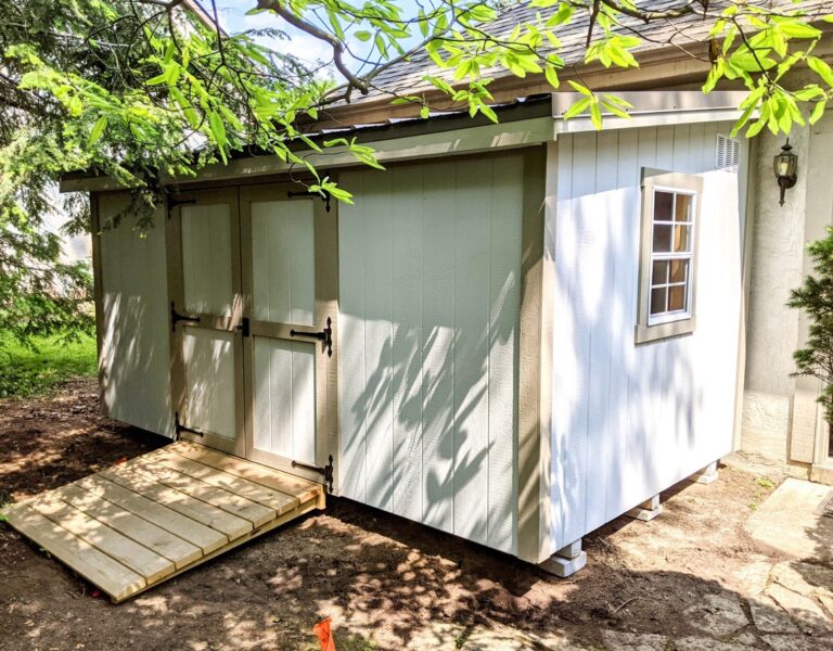 Side view of a Modern Studio shed with entry deck and siding details