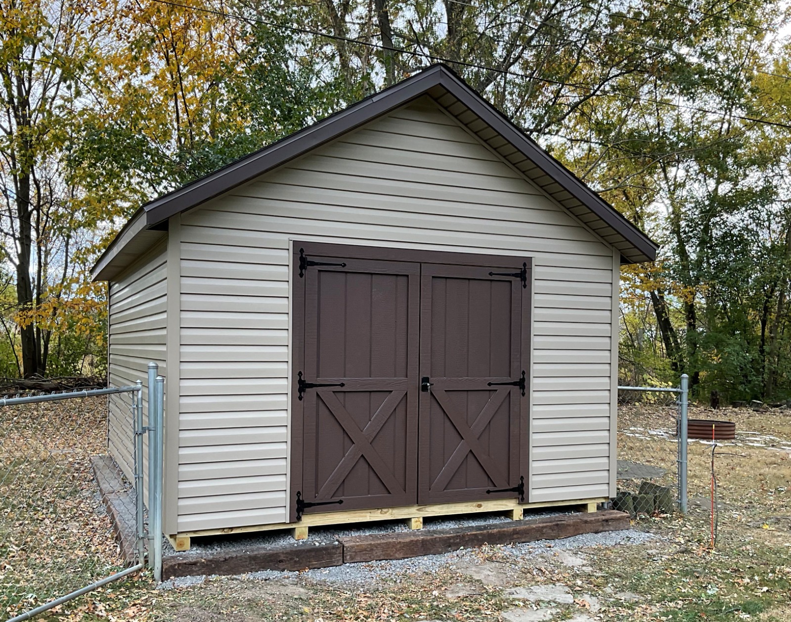 tan and brown 12x16 cape cod shed in lima ohio
