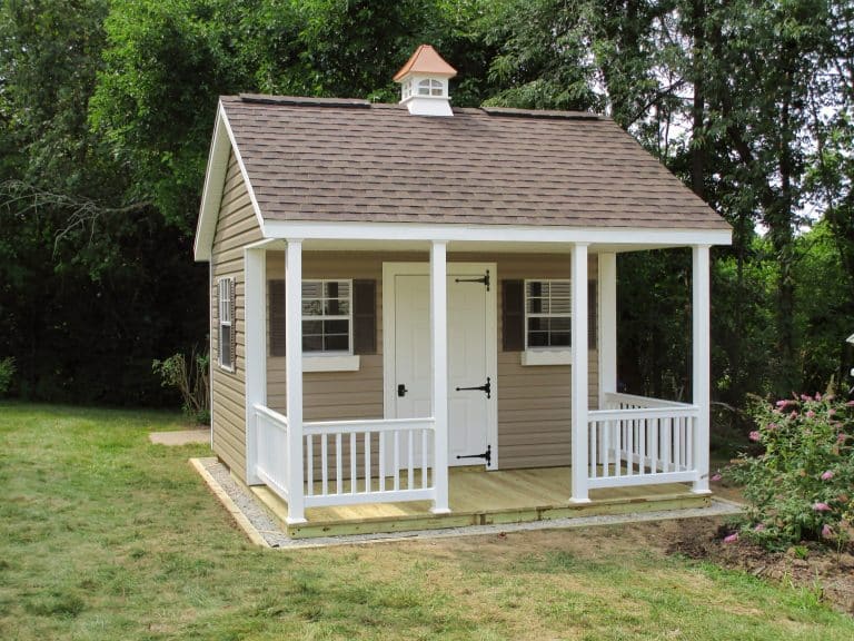 Cottage style cabin shed with porch for sale in Ohio