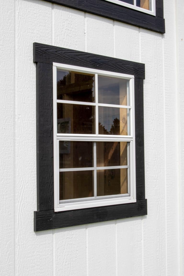 Close-up of Modern Studio shed window with black trim