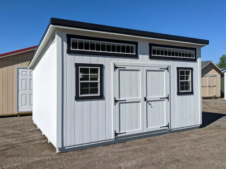 White Modern Studio shed with black trim and double front doors