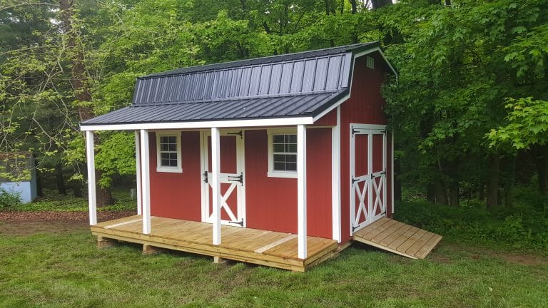 Red shed with screened front porch
