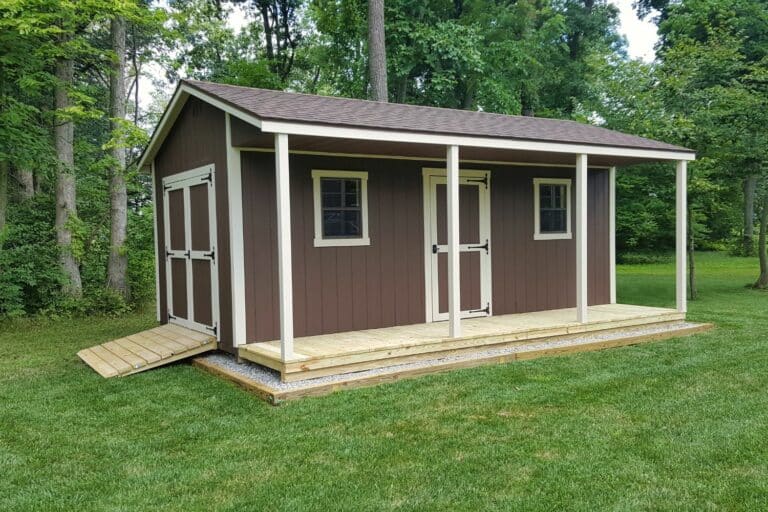 Large cabin shed with covered porch for sale in Ohio